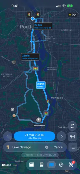 A route from downtown Portland to Lake Oswego on the Pelican map: the fastest route and two alternates, by SW Terwilliger Blvd and by SW Boones Ferry Rd, each labeled with its time